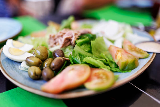 Closeup of the mixed tuna, egg and vegetable salad.\nCanon R5
