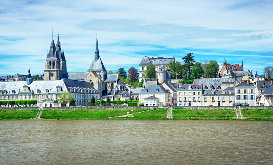 Skyline of Blois with the Loire River and St. Nicolas church, France