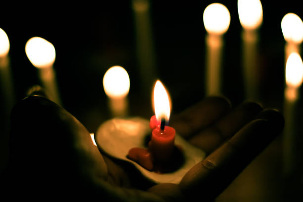 istock Candle light in the dark , Candle light background 1454829009