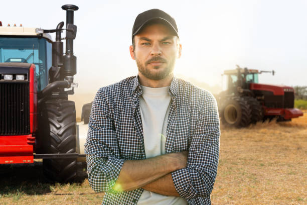 istock A bearded farmer with agricultural tractor 1454829692