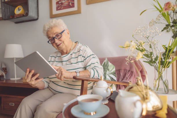 istock Senior woman at home 1454830356
