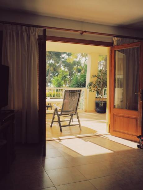 istock Chair in morning Sun light 1454830801