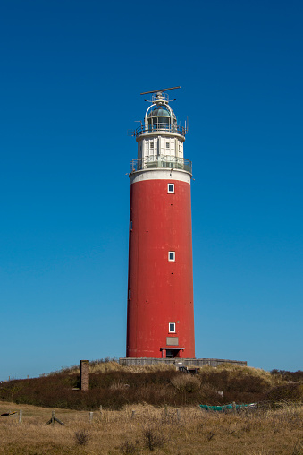 Westerheversand lighthouse in Schleswig-Holstein, Germany. Considered to be one of the best-known lighthouses in northern Germany, it was built in 1908.