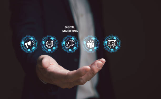 istock Selective focus at business men hand holding smartphone while search or buying online marketplace with icon show digital marketing campaign or online Search Engine Optimization to boost up sales. 1454830879