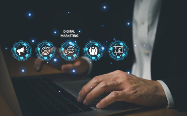 istock Selective focus at business men hand holding smartphone while search or buying online marketplace with icon show digital marketing campaign or online Search Engine Optimization to boost up sales. 1454830901