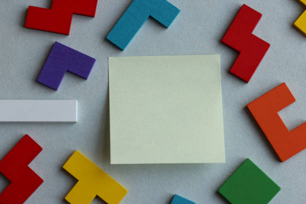 istock Wooden geometric shapes with adhesive note paper 1454833917
