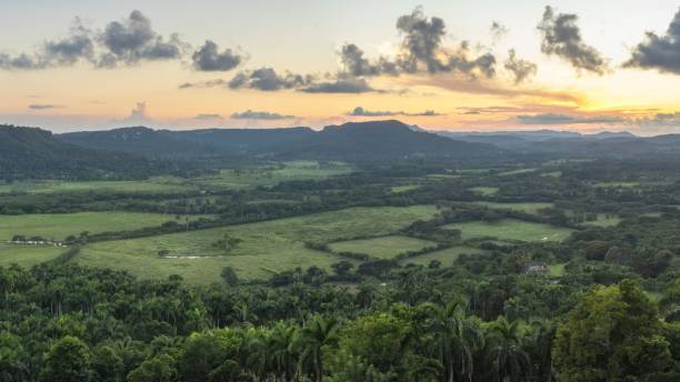 istock Bird's eye view of fields and forests during a sunset in Cuba 1454834843