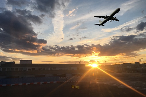 Airplane flight takeoff silhouette airport sunset travel