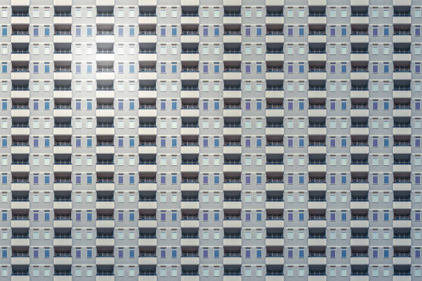 architectural pattern, high-rise building with a dreary gray concrete facade and balconies - plattenbau homes architectural detail architecture and buildings imagens e fotografias de stock