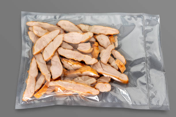 istock Roasted chicken breast slices in vacuum packed sealed 1454838611