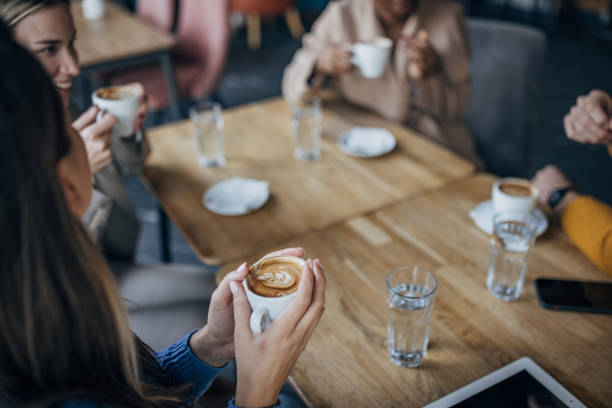 istock People in coffee shop 1454846020