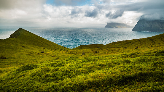 View on slopes of Kalsoy island on a way to Kallur lighthouse near Trollanes