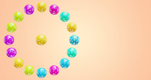Pickleballs are plastic balls with holes for playing. Circle 3D rendering