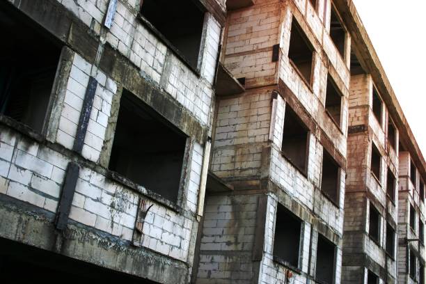 istock Old dirty concrete building 1454851860