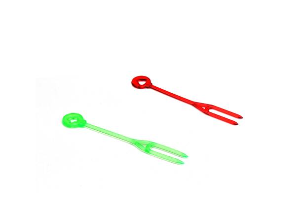 istock red and green plastic food skewer on white background 1454852831