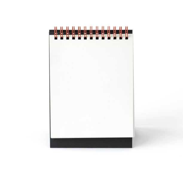 istock White blank paper desk spiral calendar on white background. 1454852931