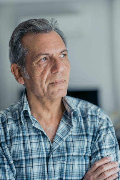 istock Portrait of Thoughtful old man 1454854497