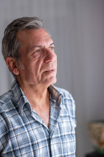 istock Portrait of Thoughtful old man 1454854534