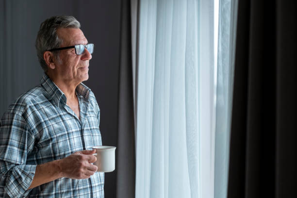 istock Portrait of smiling old man 1454854603