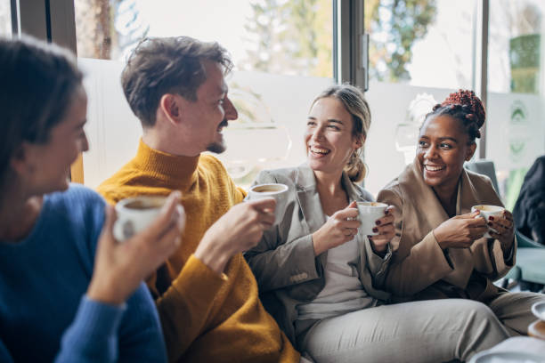 istock Modern friends in cafe 1454854781