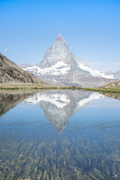 istock Matterhorn reflection in Riffelsee, Zermatt, Switzerland 1454856056