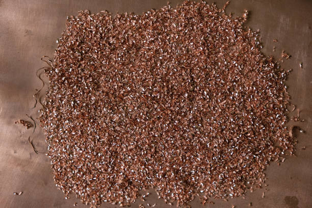 istock Copper shavings on the copper sheet surface. Top view. 1454858574