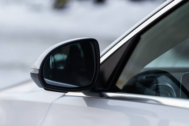 istock Rearview mirror of a modern white car. 1454861078
