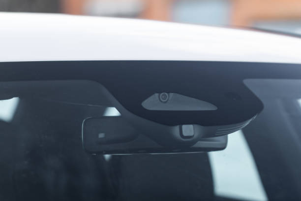 istock Windshield rain and light sensors of modern car. Car rain sensor. 1454861159