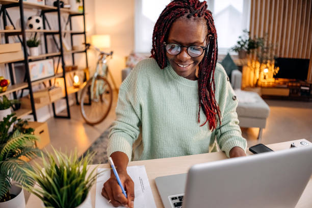 istock Woman works online on her laptop 1454862588