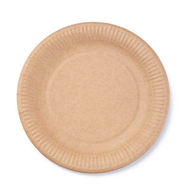 istock Empty brown disposable cardboard plate for food on a white isolated background 1454867634