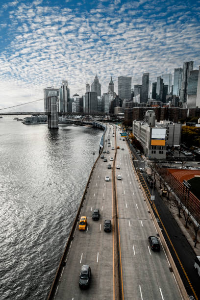 Lower Manhattan and a part of the Brooklyn Bridge seen from the Manhattan bridge stock photo