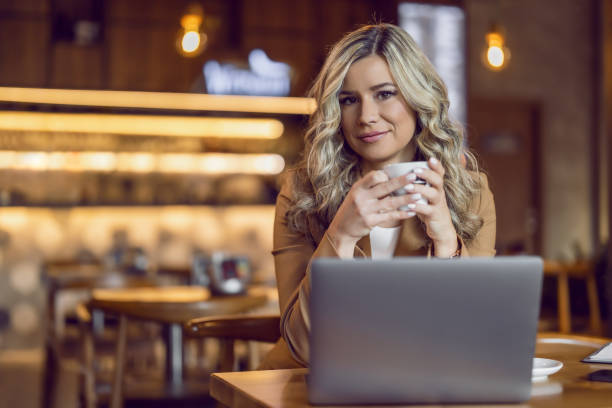 istock Businesswoman is working in cafe 1454869107