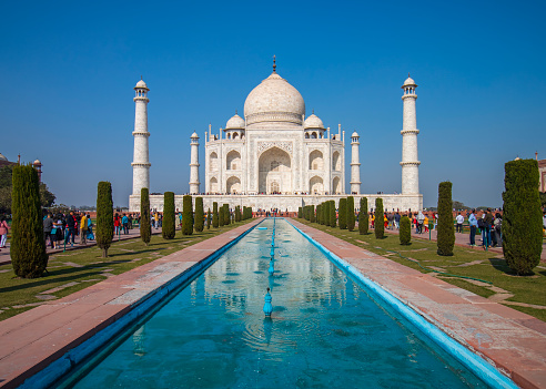 Garlic dome architecture of the Taj Mahal temple, Agra, Uttar Pradesh, India is built of white marble