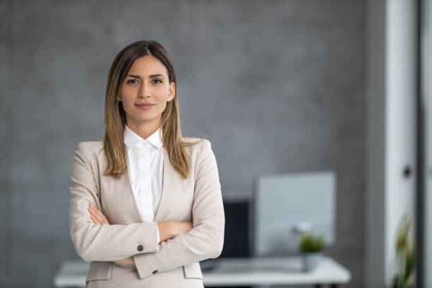 istock Smiling businesswoman at work,looking at camera 1454870297