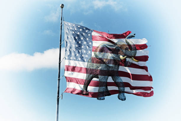 istock GOP Republican Elephant Mascot Shredding an American Flag 1454874167