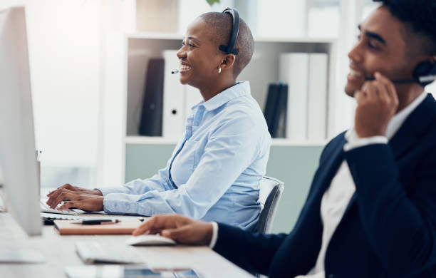 istock Contact us, call center and happy employee working in office customer service, customer support and telemarketing sales. Crm consultant, diversity and friendly, happy and online help by man and woman 1454874992