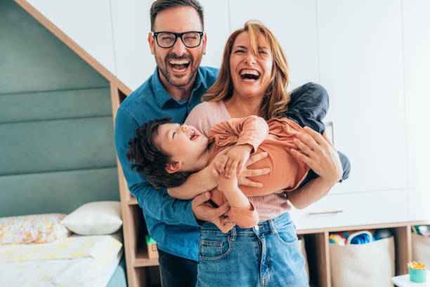 famiglia felice - family cheerful happiness domestic life foto e immagini stock
