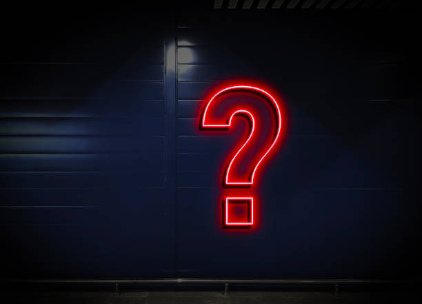 istock neon question mark sign attatched to the wall 1454878873