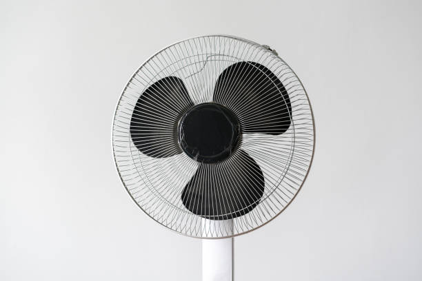 istock a close up isolated white ventilator fan at home 1454878918