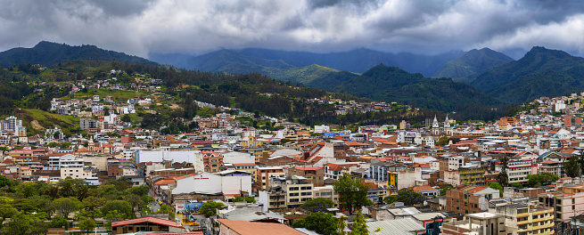 Loja, Ecuador, November 6, 2022: Panoramic view of the Ecuadorian town of Loja in the Andes under cloudy sky.
