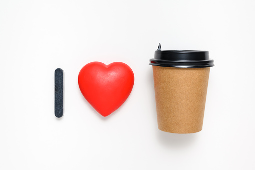 Red heart and cup of coffee on a white background. Abstract inscription I love coffee.