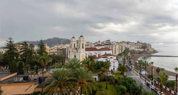 Ceuta, Spain - December 04, 2022: Panoramic view of the city of Ceuta, with its cathedral in the foreground