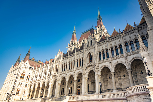 Budapest, Hungary - December 21, 2022: Beautiful Hungarian Parliament Building at sunrise in Budapest