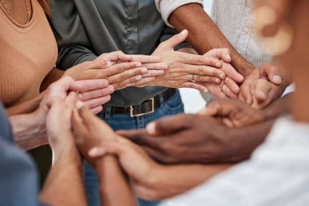 istock Community, partnership and support from hands of business people for teamwork, collaboration and trust circle. Synergy, solidarity and creative employees with solidarity, team building and mission 1454886285