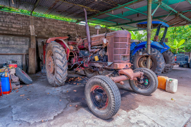 istock Tractor in a garage in a rural area 1454888857