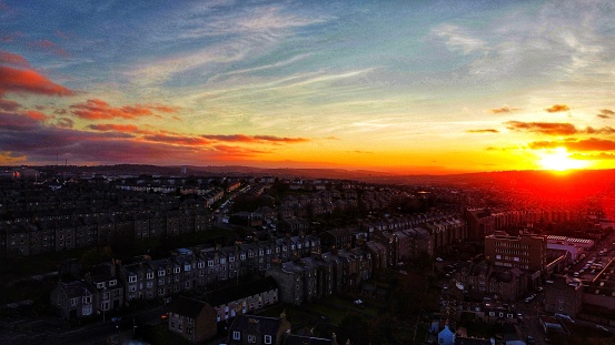 Sun setting over Torry & Aberdeen city in Scotland.