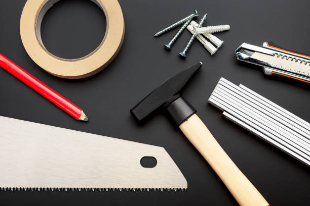 istock set of tools like hammer and saw for renovating 1454898470