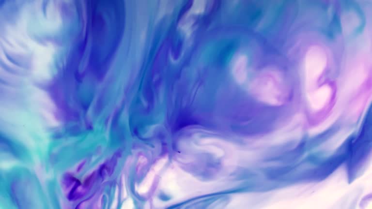 abstract background pattern forms colorful blue purple ink movements spreading morphing expanding 4k film title intro outro