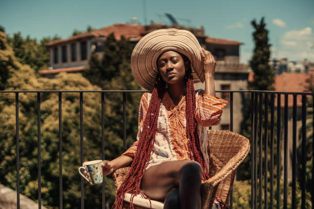 istock Pretty black woman enjoying the sun 1454910519