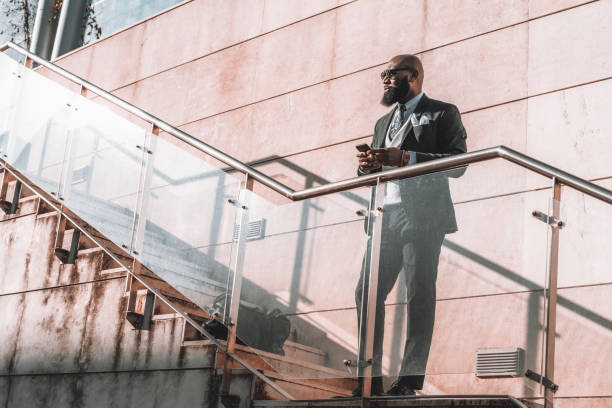 istock A black male typing in a staircase 1454910553